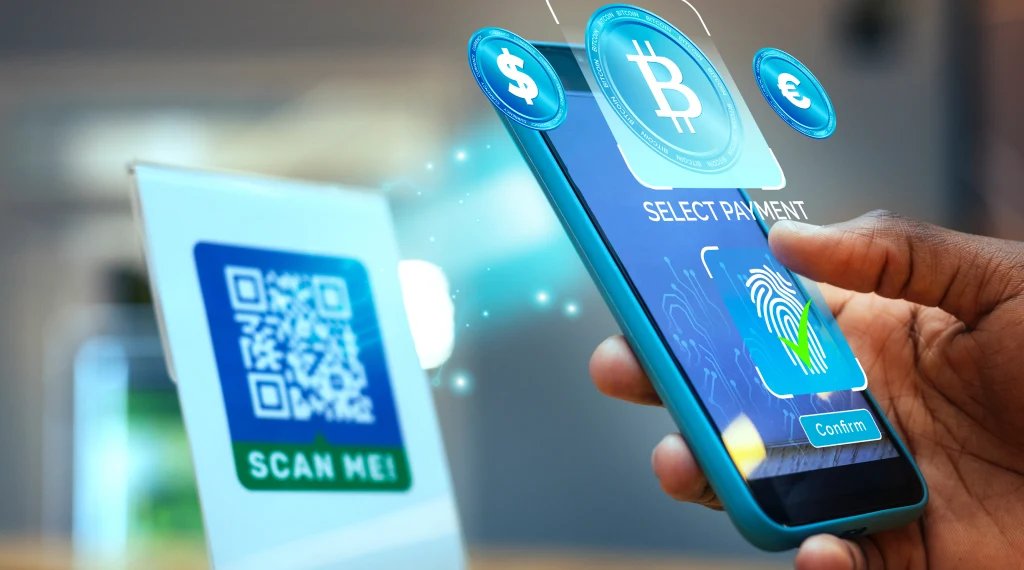 Person using a smartphone to make a cryptocurrency payment via a QR code, with Bitcoin and other currency symbols displayed on the screen.