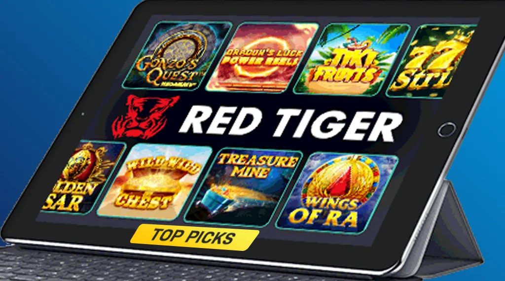 A tablet screen displaying Red Tiger’s popular online slot games, including Wild Wild Chest, Treasure Mine, and Wings of Ra.