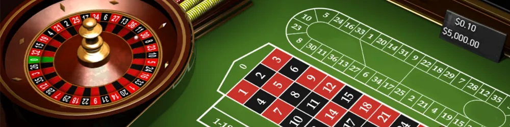 A close-up of a casino roulette wheel with a ball resting in one of the numbered slots, showcasing vibrant colors and details.