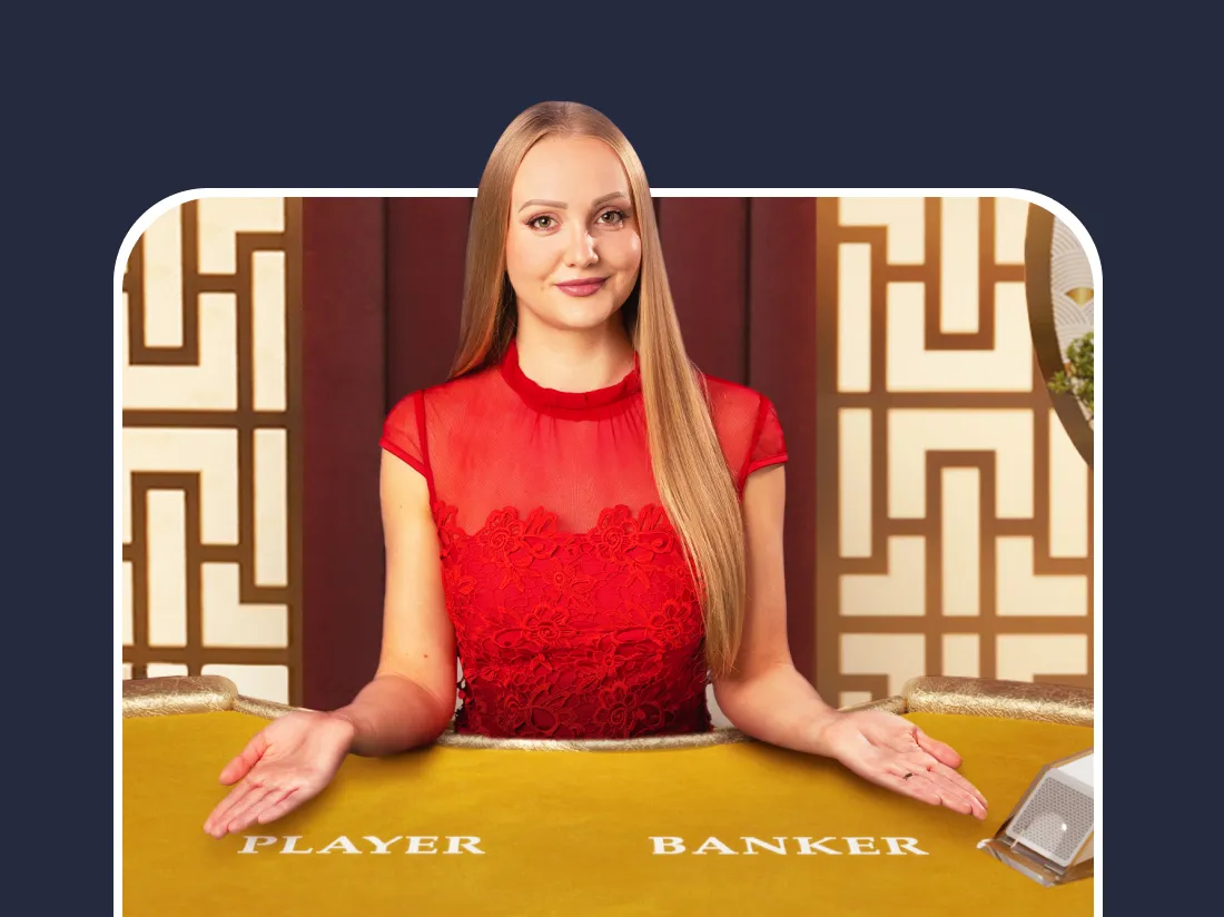 赤いドレスを着た女性ディーラーが「プレイヤー」と「バンカー」の位置を示している、スピードバカラのテーブル。